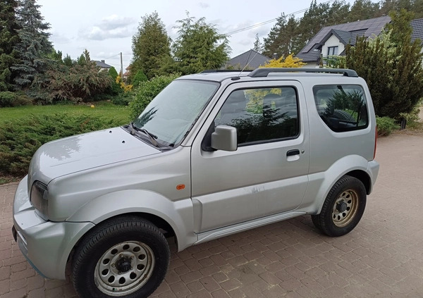 Suzuki Jimny cena 32900 przebieg: 154200, rok produkcji 2010 z Górowo Iławeckie małe 352